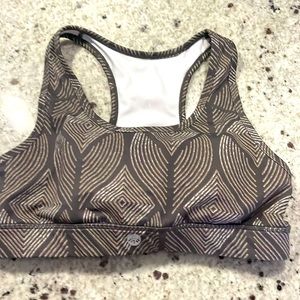 Senita sports bra, size large. Never worn with iPhone picked for running on back